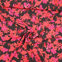 
              Viskose Stretch Blüten Blumen schwarz rosa rot
            